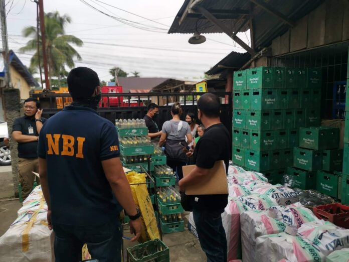 BIR and NBI padlocked grocery store in Tagum City for selling imported illegal cigarettes